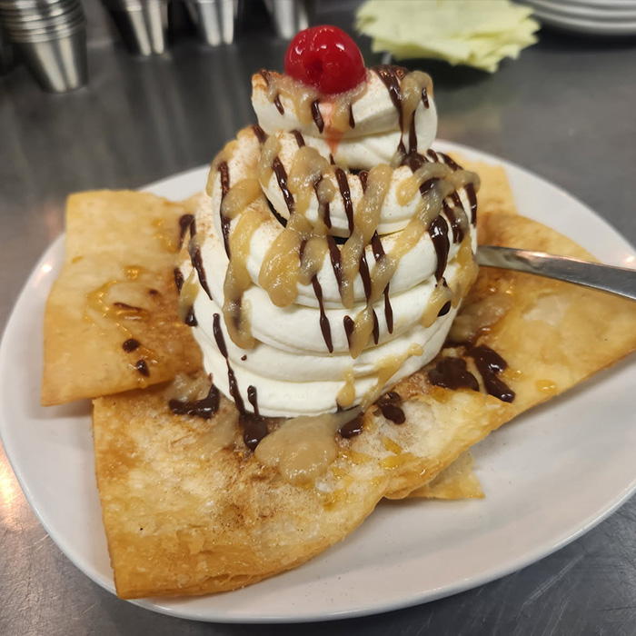 Deep fried ice cream dessert served at The Hideout restaurant and bar in Stacy, MN Deep fried ice cream dessert served at The Hideout restaurant and bar in Stacy, MN