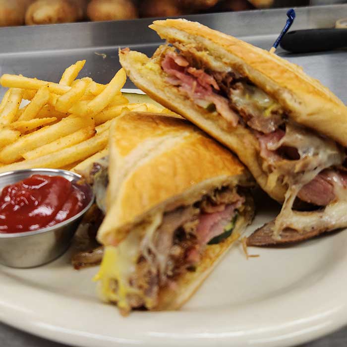 Pressed Cuban sandwich served at The Hideout restaurant and bar in Stacy, MN