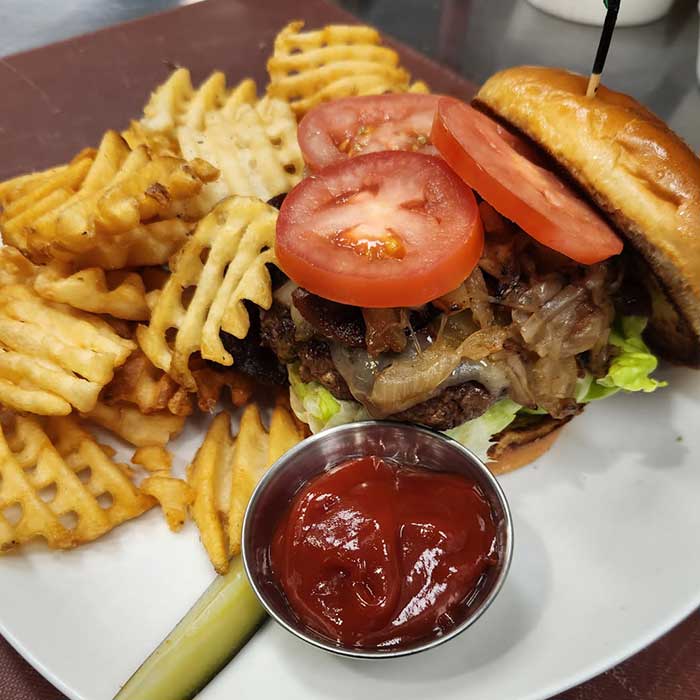Build your own burger at The Hideout restaurant and bar in Stacy, MN