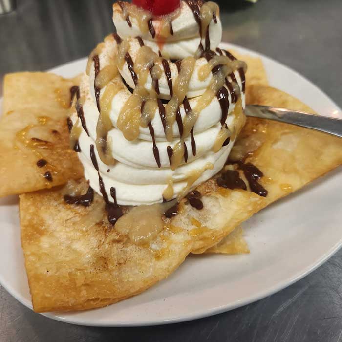 Deep fried ice cream dessert served at The Hideout restaurant and bar in Stacy, MN