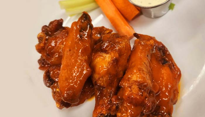 Chicken wings served at The Hideout restaurant and bar in Stacy, MN Chicken wings served at The Hideout restaurant and bar in Stacy, MN