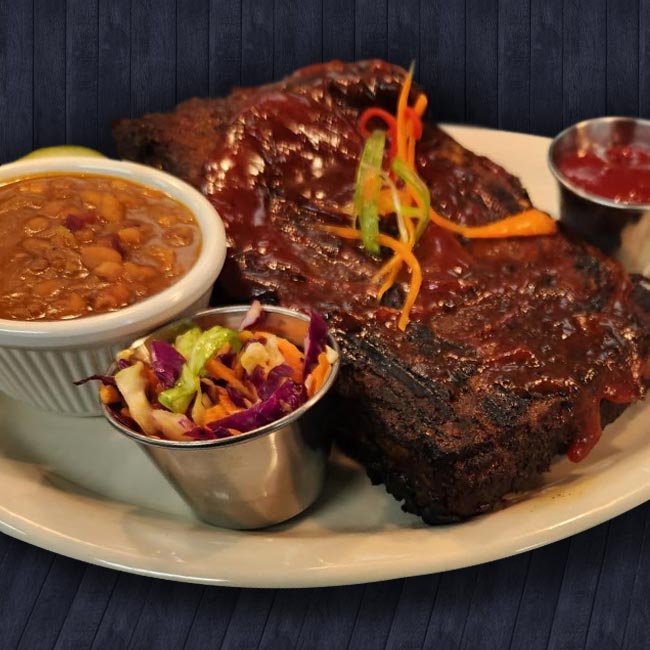 Smoked BBQ ribs served at The Hideout restaurant and bar in Stacy, MN